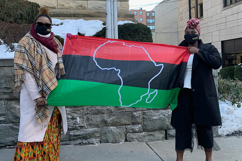 Vicki T. Sapp, PhD, and Oluwaseyi Olulana, MD Class of 2024, at the Pan-African Flag raising at Scranton City Hall in 2021.