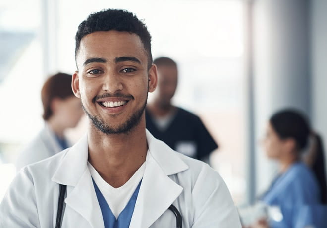 A smiling medical student