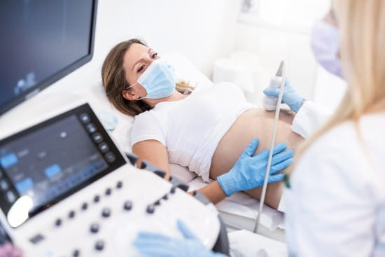 an image of a woman getting an ultrasound
