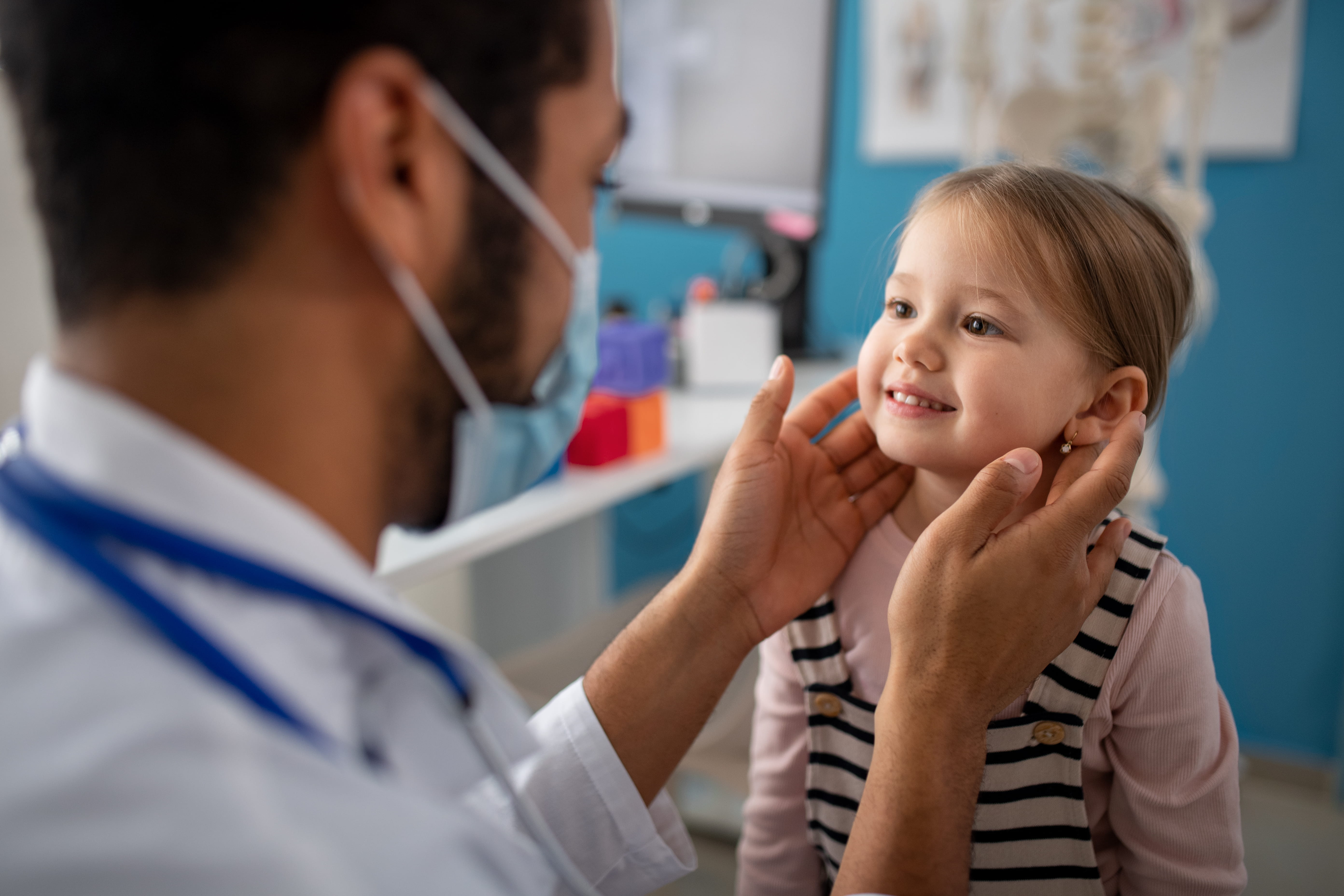 A child receiving an otolaryngology check-up